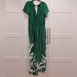 Anthropologie green jumpsuit with White Leaf Pattern